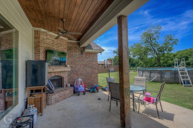1029 Spanish Moss Cir, Bossier City, LA 71111 - view of patio with outdoor dining area, a ceiling fan, an outdoor pool, and a playground