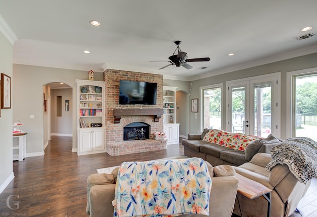1029 Spanish Moss Cir, Bossier City, LA 71111 - living room with arched walkways, ornamental molding, a ceiling fan, baseboards, and recessed lighting