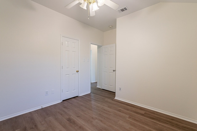 7028 Herman Jared Dr, North Richland Hills, TX 76182 - unfurnished bedroom featuring dark wood finished floors, baseboards, and a ceiling fan
