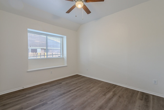 7028 Herman Jared Dr, North Richland Hills, TX 76182 - unfurnished room featuring dark wood-type flooring, a ceiling fan, baseboards, and vaulted ceiling
