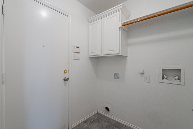 7028 Herman Jared Dr, North Richland Hills, TX 76182 - laundry room with hookup for an electric dryer, washer hookup, hookup for a gas dryer, cabinet space, and baseboards