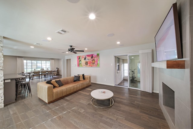 3116 Sharpview Ln, Dallas, TX 75228 - living area with a fireplace, recessed lighting, wood finished floors, and a ceiling fan