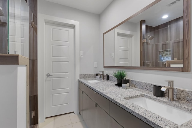 3116 Sharpview Ln, Dallas, TX 75228 - bathroom with double vanity, tile patterned floors, and a stall shower