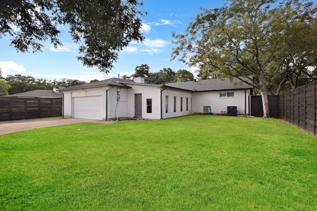 3116 Sharpview Ln, Dallas, TX 75228 - back of property with driveway, an attached garage, and brick siding