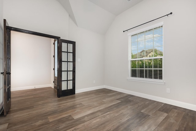 302 Micco Ln, Rockwall, TX 75087 - empty room featuring french doors, wood finished floors, vaulted ceiling, and baseboards