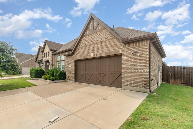 302 Micco Ln, Rockwall, TX 75087 - view of front of home featuring brick siding, a garage, driveway, and a shingled roof