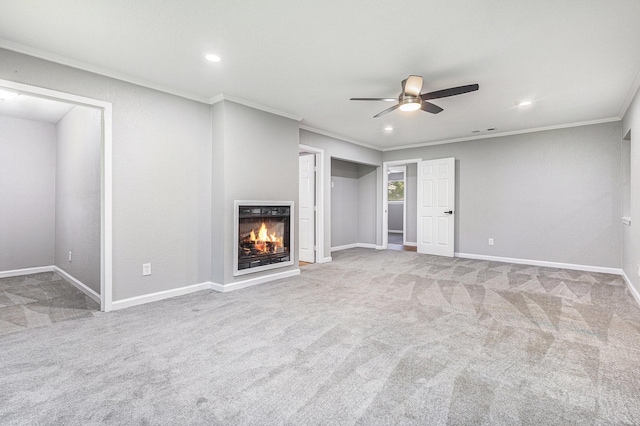 6412 Regal Rd, Forest Hill, TX 76119 - unfurnished living room featuring ornamental molding, ceiling fan, carpet floors, a glass covered fireplace, and recessed lighting