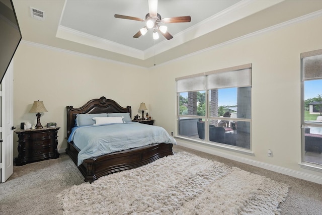 1330 Billingsley Dr, Waxahachie, TX 75167 - bedroom featuring carpet flooring, a tray ceiling, crown molding, baseboards, and a ceiling fan