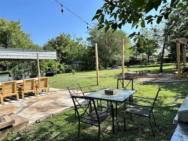 107 S Lakeview Dr, Lacy Lakeview, TX 76705 - view of patio / terrace featuring outdoor dining space and a fire pit