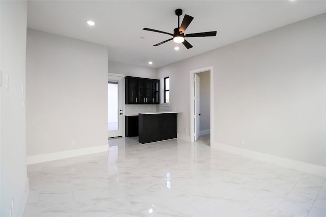 10787 Leake Ln, Frisco, TX 75035 - unfurnished living room with light marble finish flooring, recessed lighting, ceiling fan, and baseboards