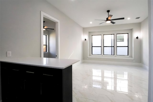 10787 Leake Ln, Frisco, TX 75035 - spare room featuring a ceiling fan and recessed lighting
