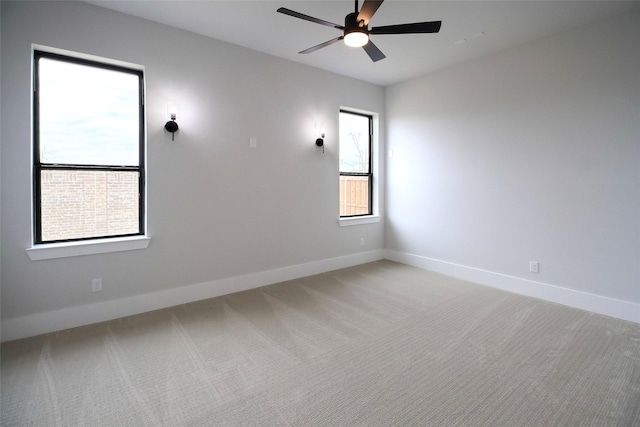 10787 Leake Ln, Frisco, TX 75035 - empty room with ceiling fan, light carpet, and baseboards