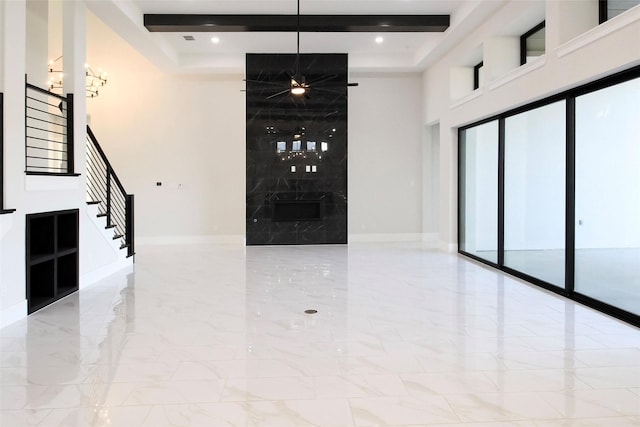 10787 Leake Ln, Frisco, TX 75035 - interior space featuring marble finish floors, stairs, a towering ceiling, baseboards, and recessed lighting