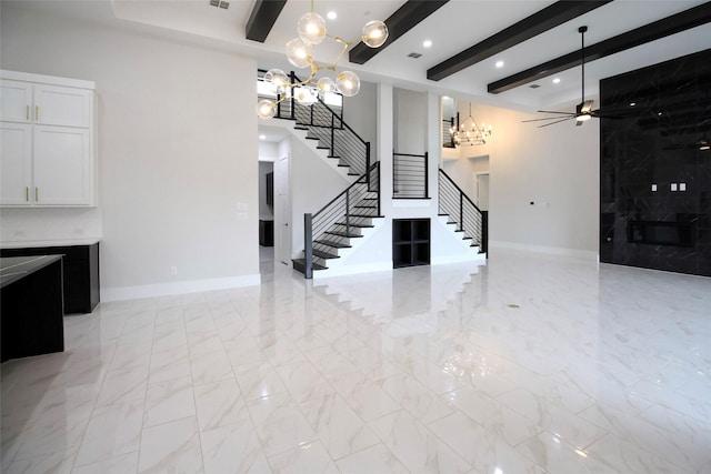 10787 Leake Ln, Frisco, TX 75035 - unfurnished living room featuring a chandelier, beam ceiling, stairway, recessed lighting, and baseboards