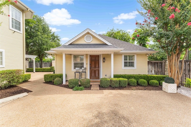 1906 S 11th St, Waco, TX 76706 - view of front of home featuring a porch and roof with shingles