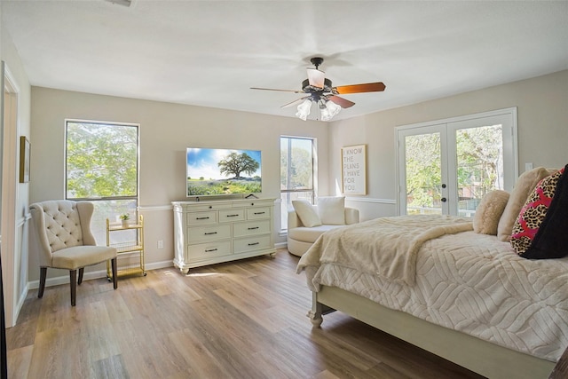 7208 Maranatha Ct, Colleyville, TX 76034 - bedroom featuring french doors, access to exterior, multiple windows, and light wood-style flooring