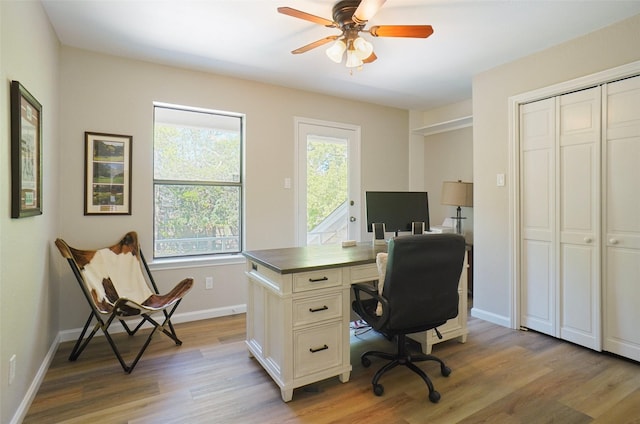 7208 Maranatha Ct, Colleyville, TX 76034 - home office with light wood finished floors, baseboards, and a ceiling fan