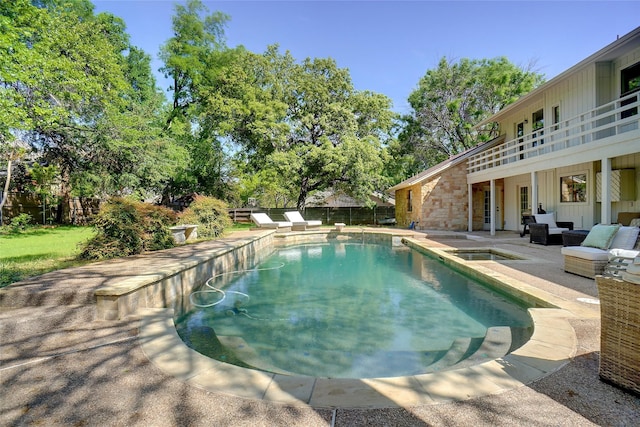 7208 Maranatha Ct, Colleyville, TX 76034 - view of pool with an outdoor hangout area, a patio area, a fenced backyard, and a pool with connected hot tub