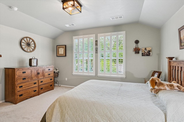901 Freesia Dr, Little Elm, TX 75068 - bedroom featuring lofted ceiling, light colored carpet, and baseboards