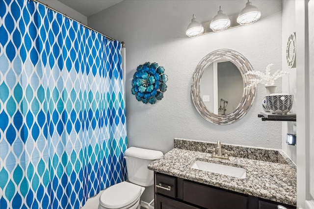 901 Freesia Dr, Little Elm, TX 75068 - bathroom featuring vanity, toilet, and a shower with curtain