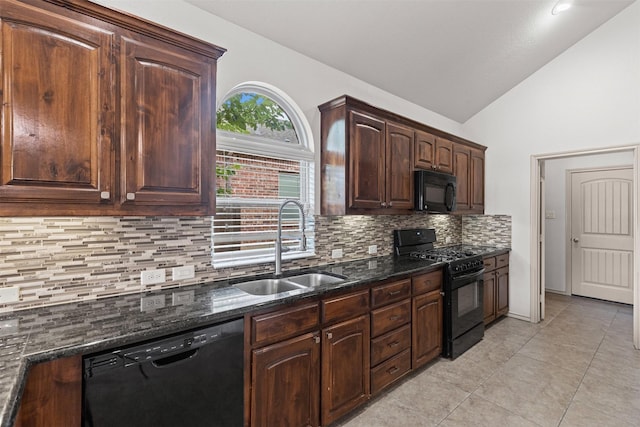 10409 Boxthorn Ct, Fort Worth, TX 76177 - kitchen featuring black appliances, a sink, lofted ceiling, tasteful backsplash, and dark stone countertops