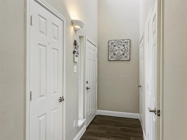 157 Castleridge Dr Unit B, Little Elm, TX 75068 - corridor with dark wood-style flooring and baseboards