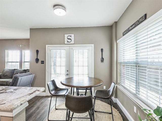 157 Castleridge Dr Unit B, Little Elm, TX 75068 - dining space featuring plenty of natural light, wood finished floors, and baseboards