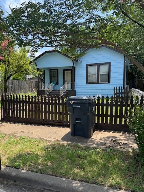 1806 Live Oak Ave, Waco, TX 76708 - bungalow with a fenced front yard and covered porch