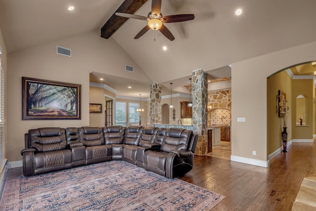 436 Highbluff Trl, Royse City, TX 75189 - living area with arched walkways, beam ceiling, ceiling fan, high vaulted ceiling, and wood finished floors