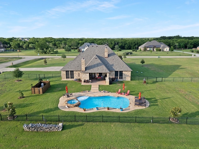 436 Highbluff Trl, Royse City, TX 75189 - view of pool with a patio area, a pool with connected hot tub, a fenced backyard, and view of wooded area