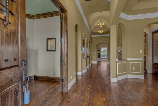 436 Highbluff Trl, Royse City, TX 75189 - foyer with arched walkways, dark wood-style floors, a chandelier, and ornamental molding