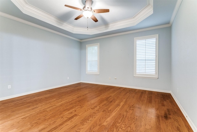 805 Evergreen Ct, Keller, TX 76248 - spare room with a raised ceiling, a ceiling fan, wood finished floors, crown molding, and baseboards