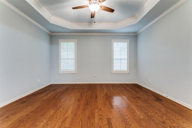 805 Evergreen Ct, Keller, TX 76248 - empty room with a raised ceiling, healthy amount of natural light, ceiling fan, wood finished floors, and ornamental molding