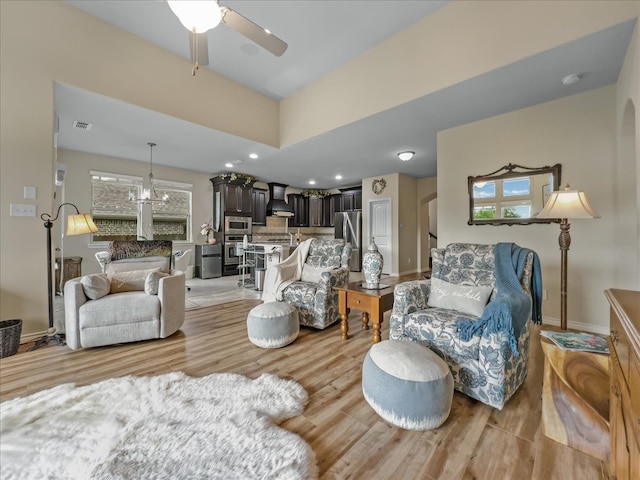 1316 Heather Ln, Little Elm, TX 75068 - living room with light wood finished floors and ceiling fan