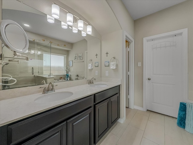 1316 Heather Ln, Little Elm, TX 75068 - full bath with double vanity, tile patterned floors, and a shower stall