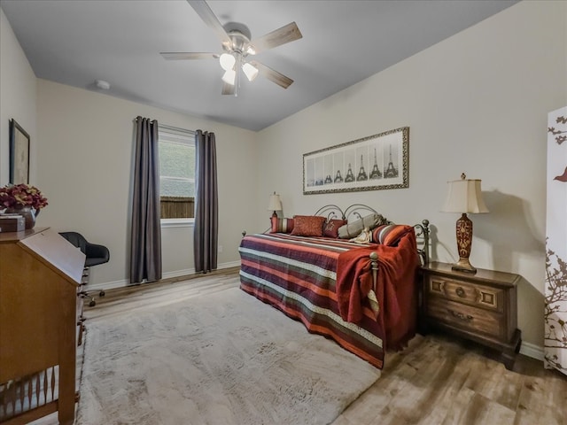 1316 Heather Ln, Little Elm, TX 75068 - bedroom featuring wood finished floors, ceiling fan, and a desk
