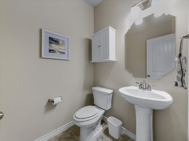 1316 Heather Ln, Little Elm, TX 75068 - half bath with toilet and tile patterned flooring
