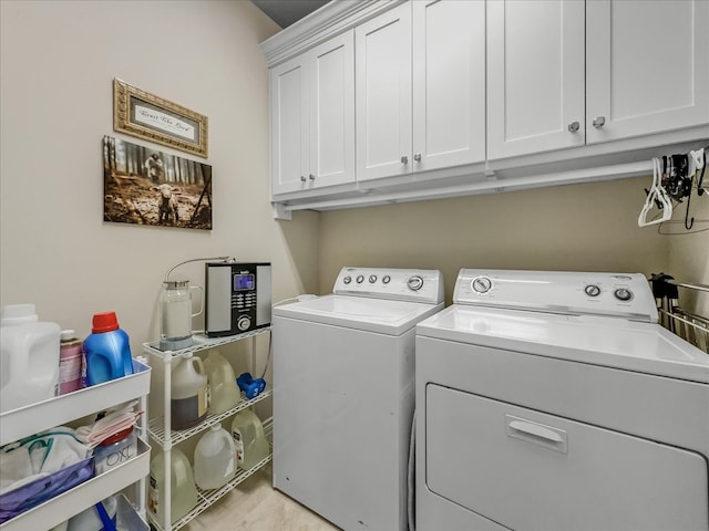 1316 Heather Ln, Little Elm, TX 75068 - laundry area with washer and clothes dryer and cabinet space