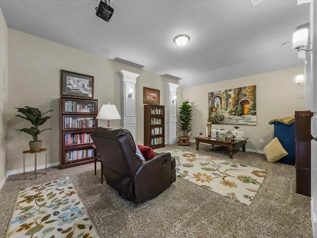 1316 Heather Ln, Little Elm, TX 75068 - living room featuring carpet and decorative columns