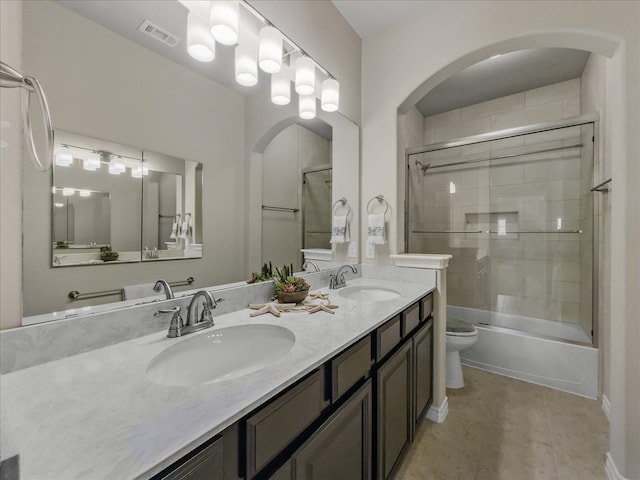 1316 Heather Ln, Little Elm, TX 75068 - bathroom with double vanity, shower / bathtub combination, and tile patterned floors