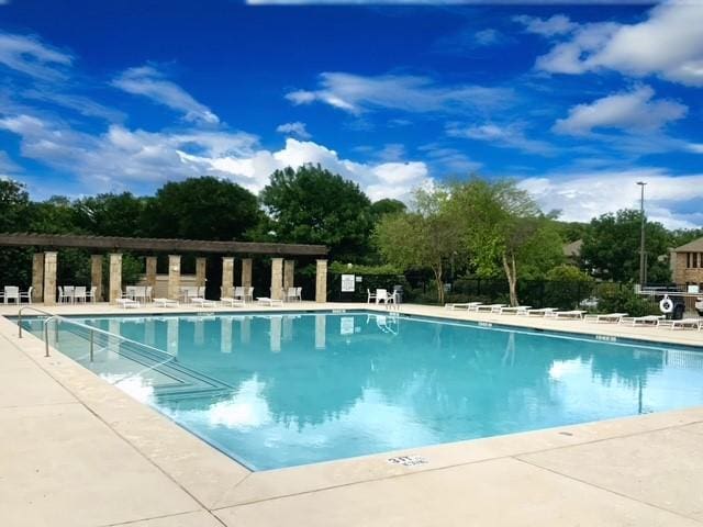 1316 Heather Ln, Little Elm, TX 75068 - community pool featuring a patio