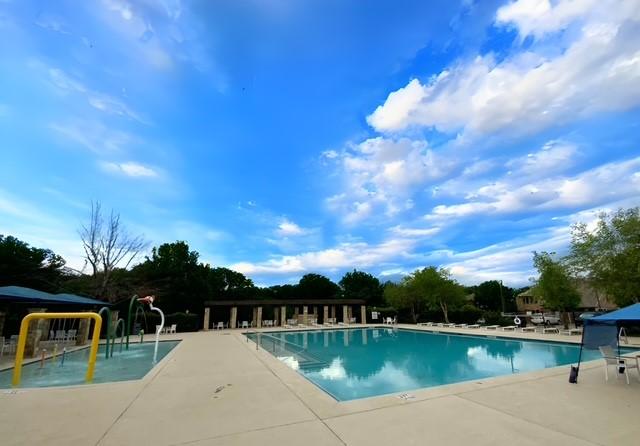 1316 Heather Ln, Little Elm, TX 75068 - community pool featuring a patio area