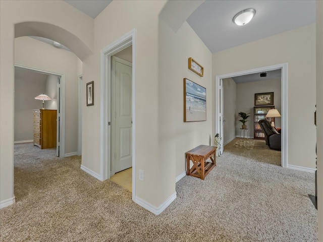 1316 Heather Ln, Little Elm, TX 75068 - hall featuring carpet flooring and arched walkways