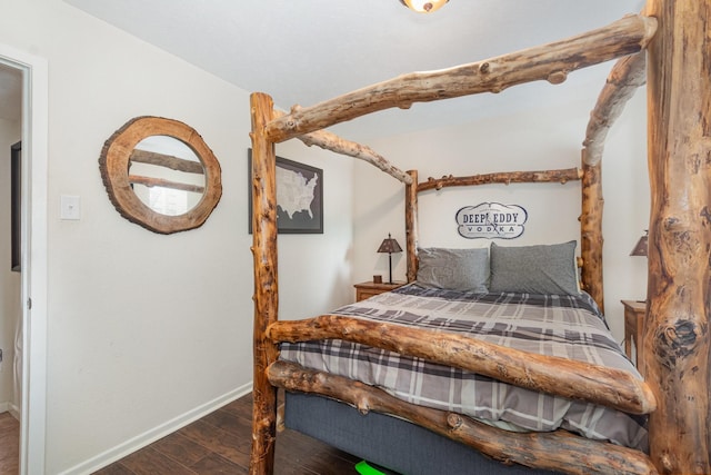 4317 Hartford St Unit 102, Dallas, TX 75219 - bedroom featuring wood finished floors and baseboards