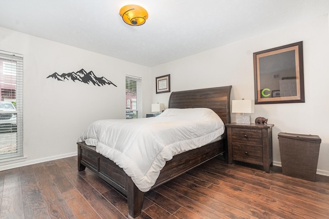 4317 Hartford St Unit 102, Dallas, TX 75219 - bedroom featuring dark wood-style floors and baseboards