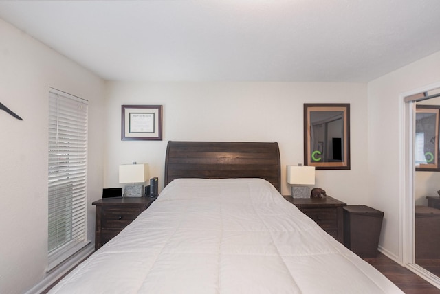 4317 Hartford St Unit 102, Dallas, TX 75219 - bedroom featuring wood finished floors and baseboards