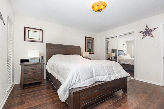 4317 Hartford St Unit 102, Dallas, TX 75219 - bedroom featuring dark wood-style flooring and a closet