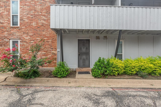 4317 Hartford St Unit 102, Dallas, TX 75219 - doorway to property with brick siding