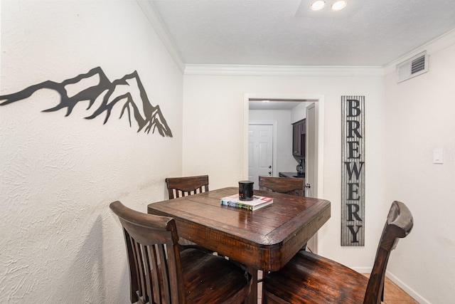 4317 Hartford St Unit 102, Dallas, TX 75219 - dining space featuring ornamental molding and baseboards