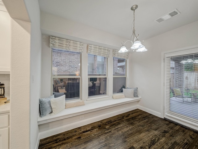413 Winehart St, Lewisville, TX 75056 - unfurnished room with dark wood-style flooring, a chandelier, and baseboards